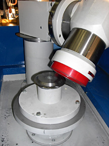 CNC circular knife grinder with periphery grind for tissue knives